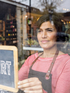 businesswoman opening her store