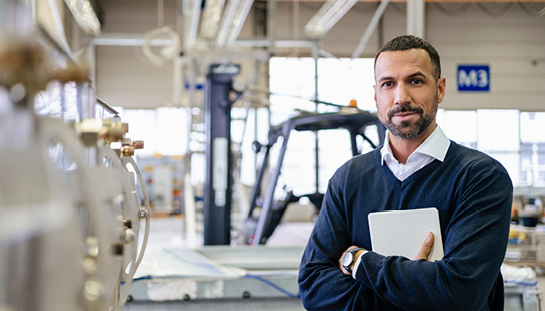 man standing in a factory