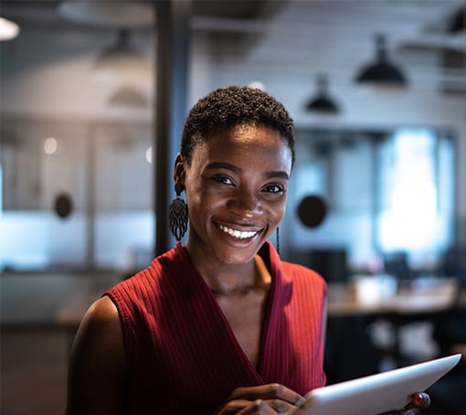 Entrepreneur smiling, getting financing that suits her needs