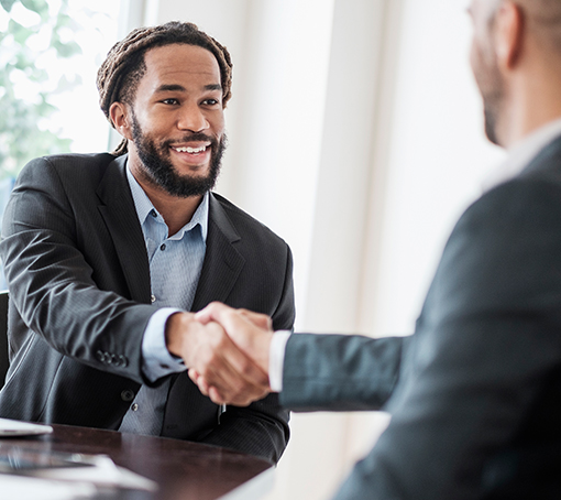 Man closing a deal to financing commercial real estate