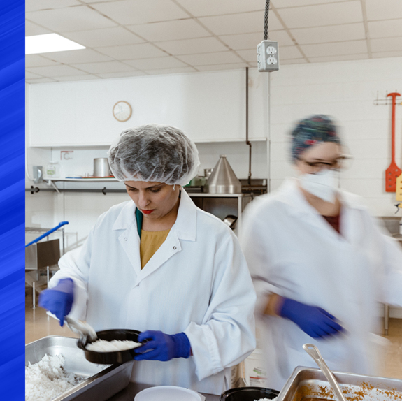 Employees working at shivani's kitchen food plant in halifax