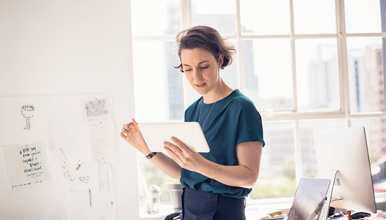 businesswoman working on her ipad