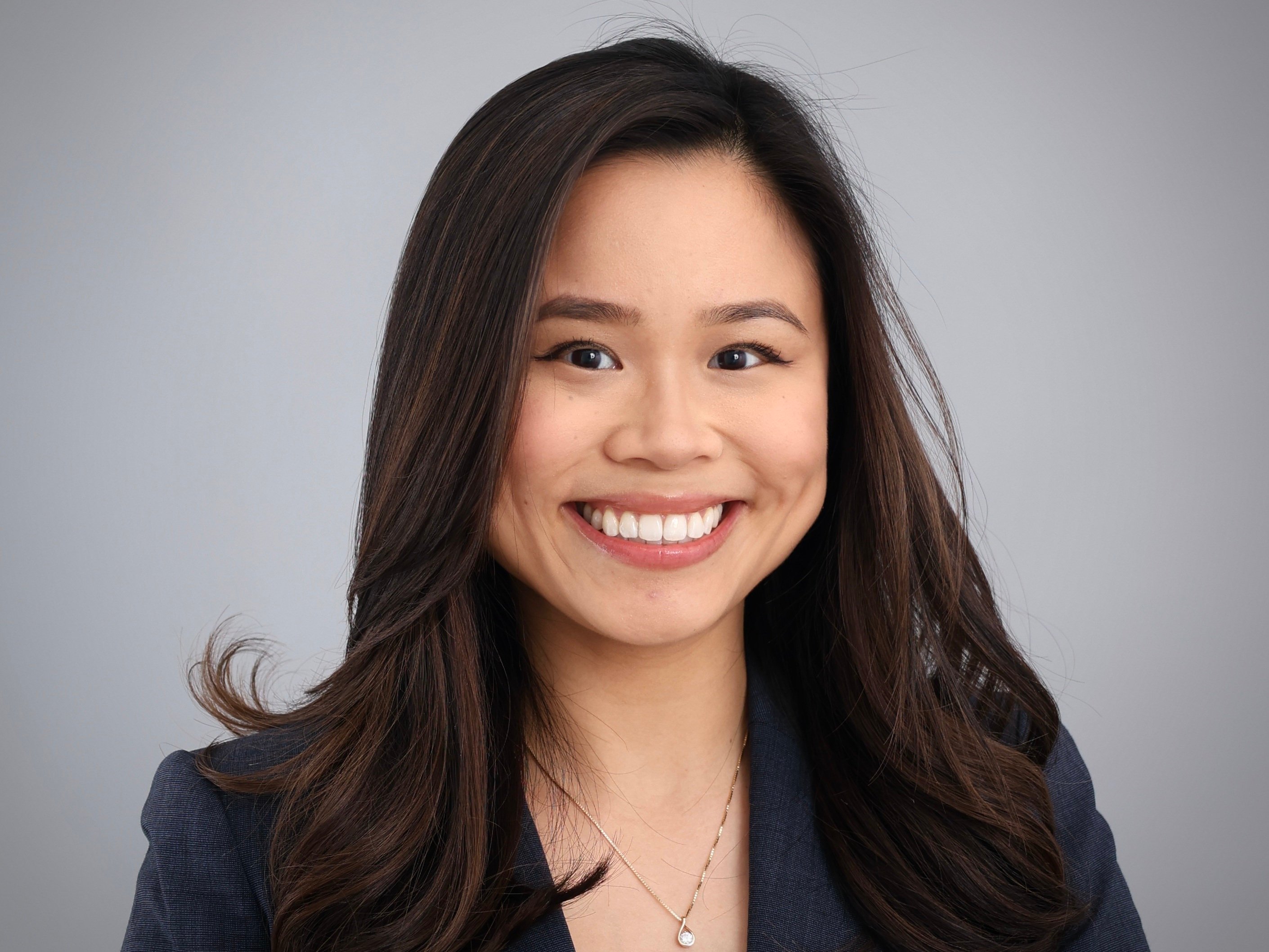 Emilie Ong Associate Director