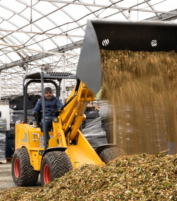 person on a tractor in a farm